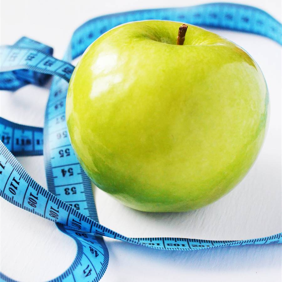 Manzana y cinta métrica