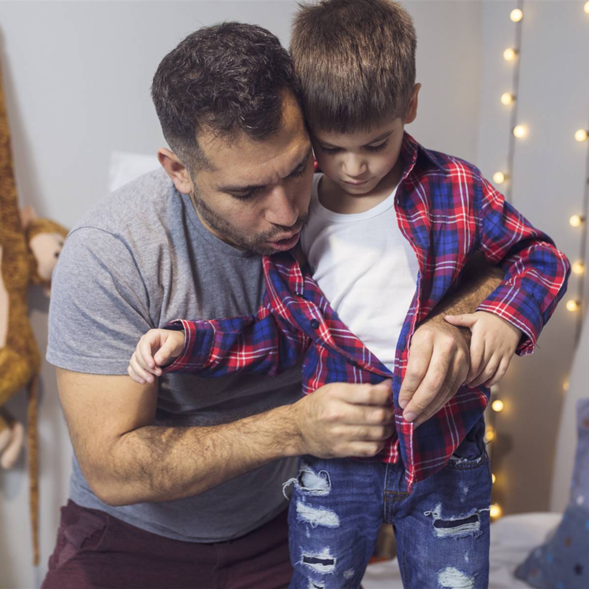 vestir al niño aprendizaje
